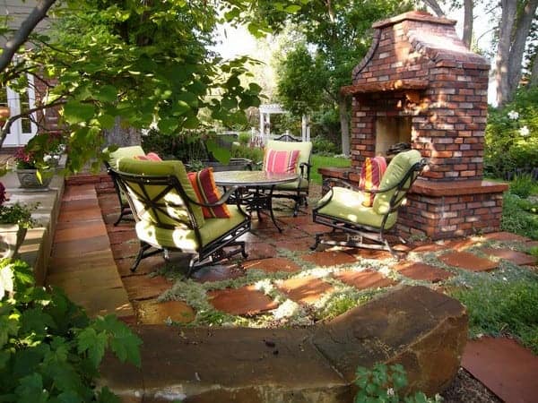 outdoor fireplace green seating