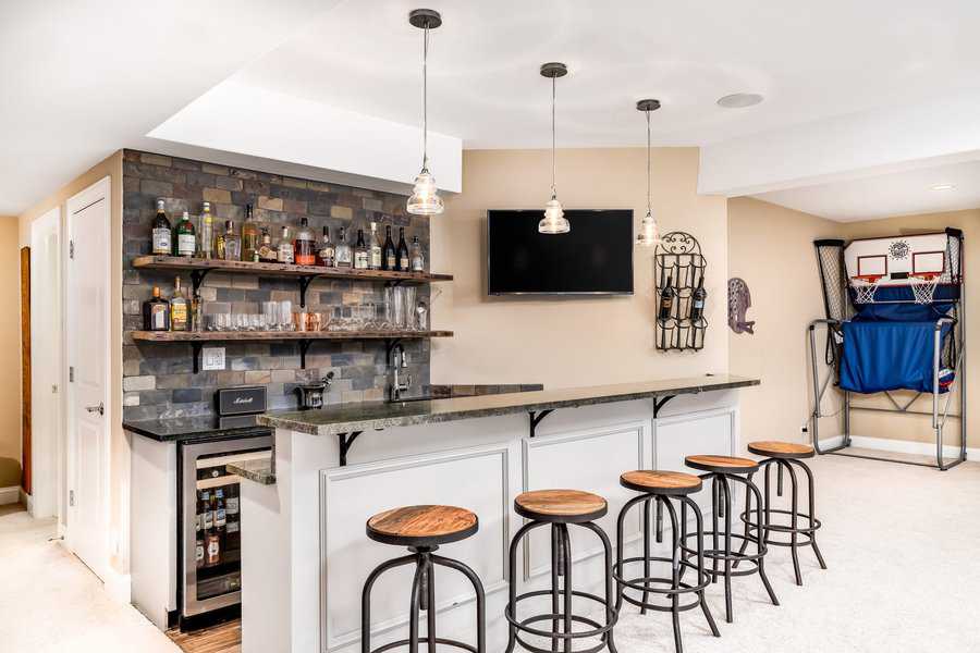 Man cave bar with stools