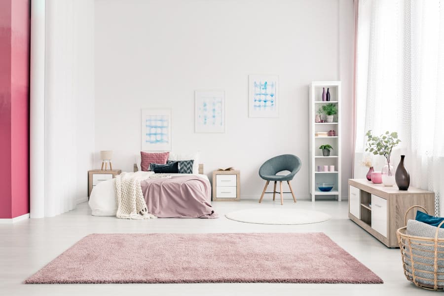 Pink carpet in spacious bedroom