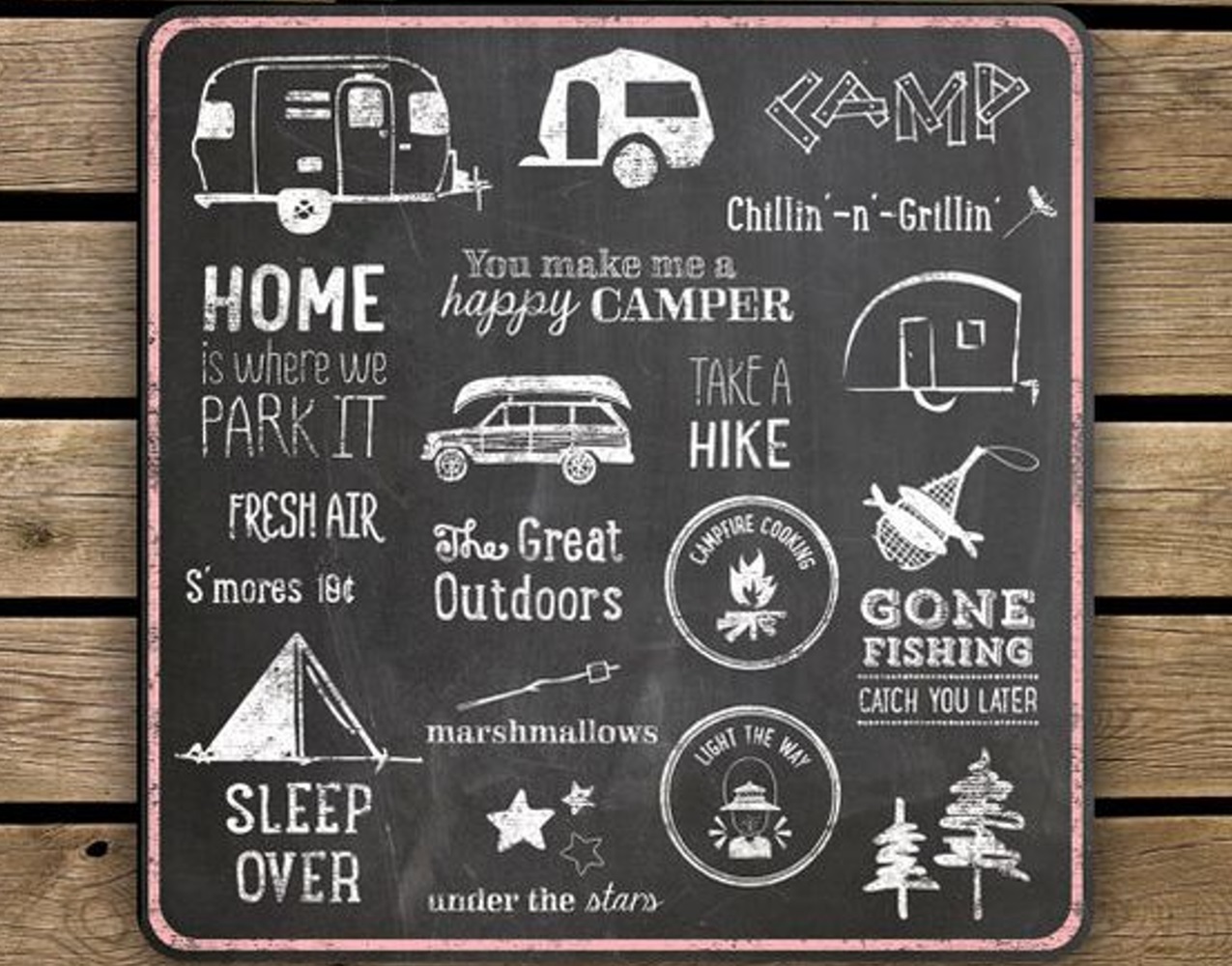 Chalkboard art with camping-themed drawings and quotes on a wooden background.