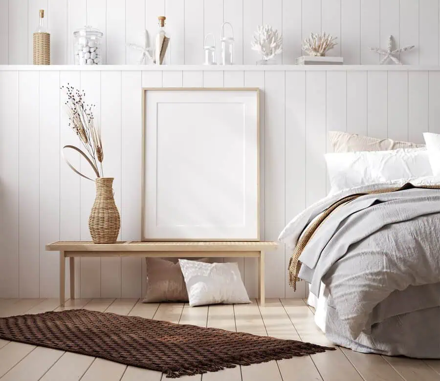 Scandinavian-inspired bedroom with minimalist decor, wicker accents, and a neutral color palette.