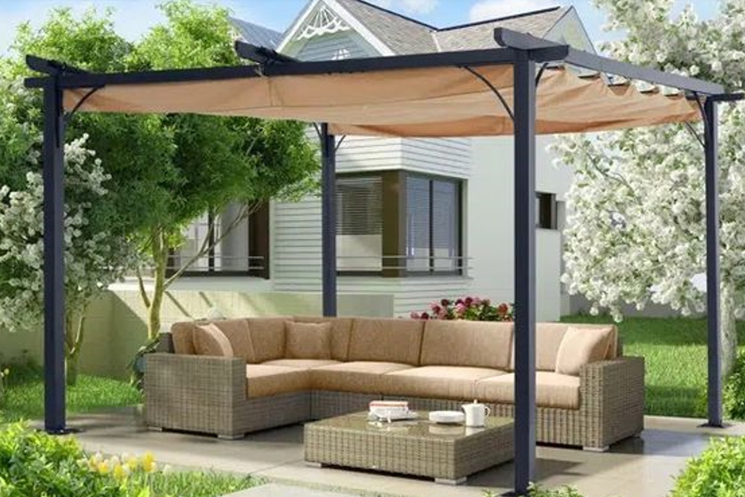 Outdoor pergola with shaded seating area, wicker couch, and small table in a garden setting