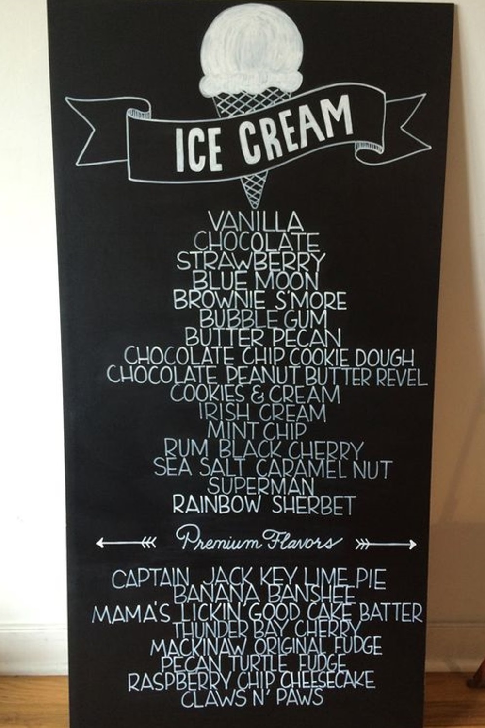 Chalkboard menu with various ice cream flavors and a banner reading "Ice Cream".