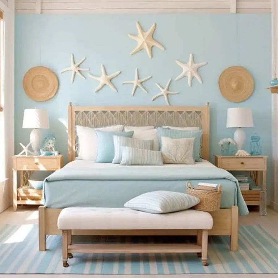 Coastal-themed bedroom with blue and white decor, starfish wall art, and striped rug