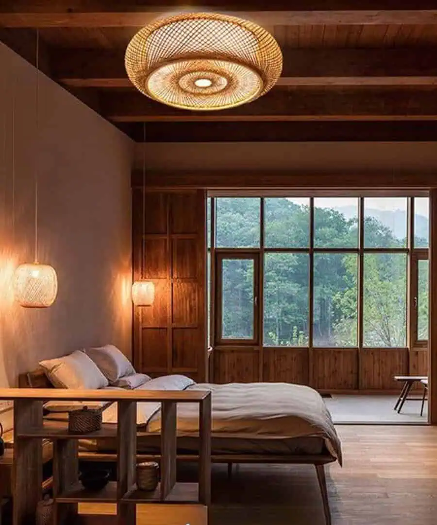 A cozy bedroom with large windows, wooden accents, and soft ambient lighting.