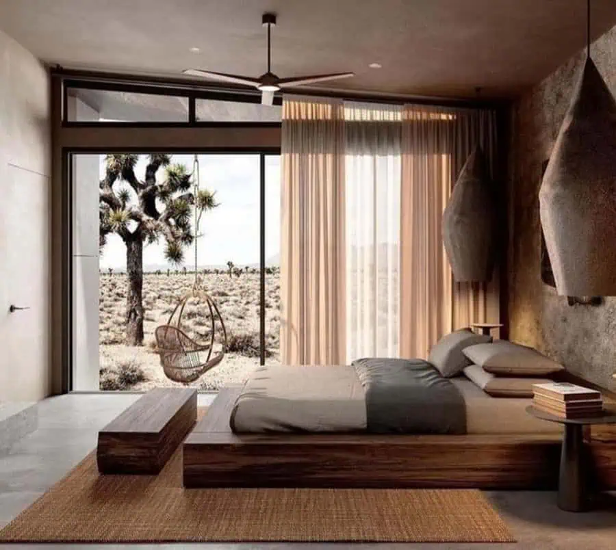 Modern bedroom with a desert view, wooden furniture, and neutral tones.