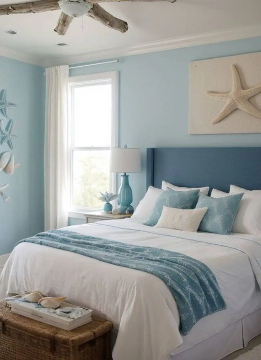 Coastal-themed bedroom with blue accents, starfish decor, and a woven bench at the foot of the bed