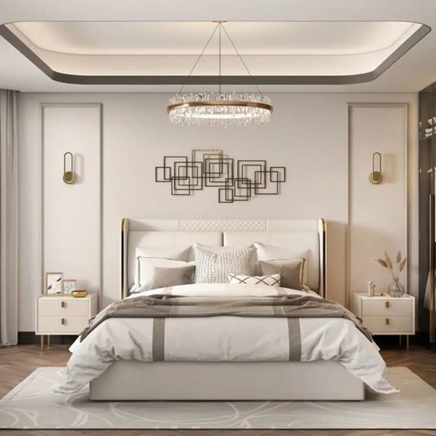 Modern bedroom with a chandelier, abstract wall art, a neatly made bed, and two bedside tables.