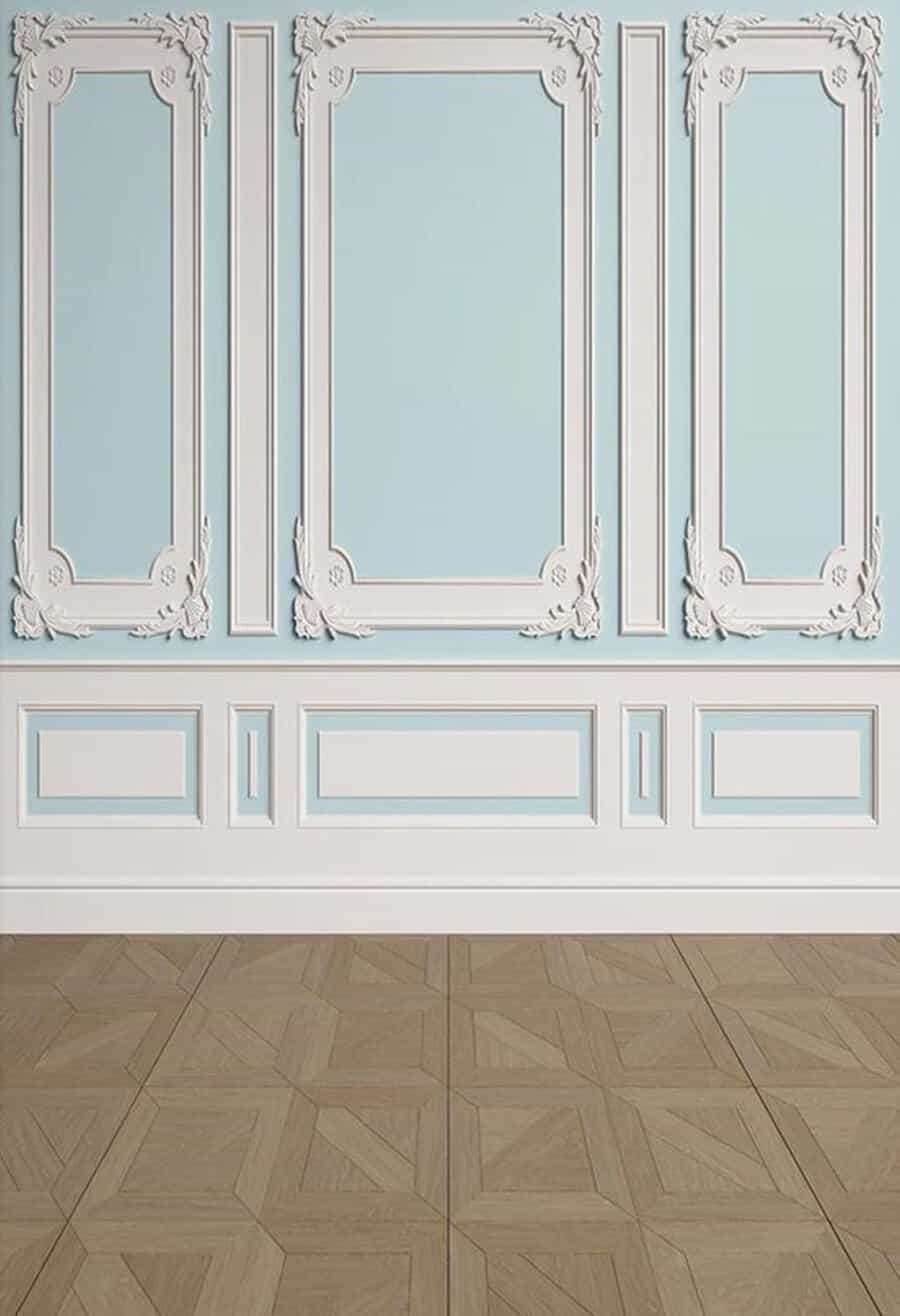 Elegant room with ornate blue and white wall panels and parquet wood flooring