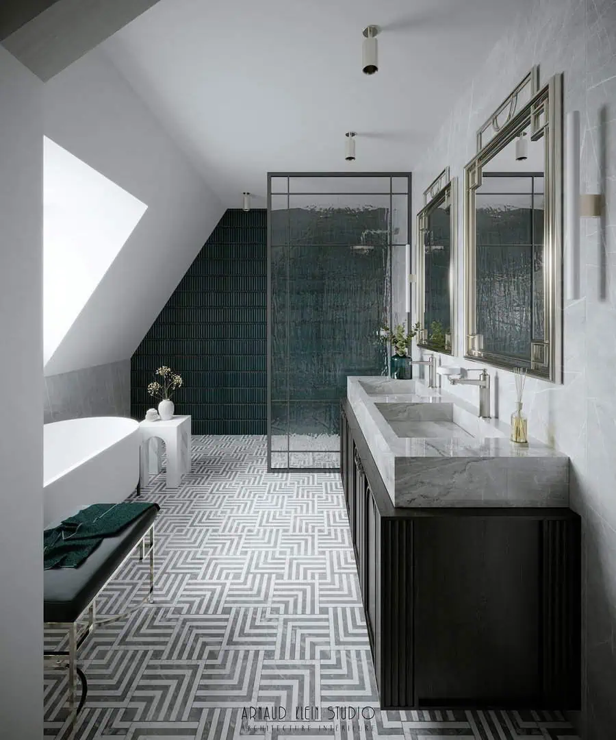 Modern Art Deco bathroom with geometric floor tiles, double sink vanity, and glass shower enclosure.