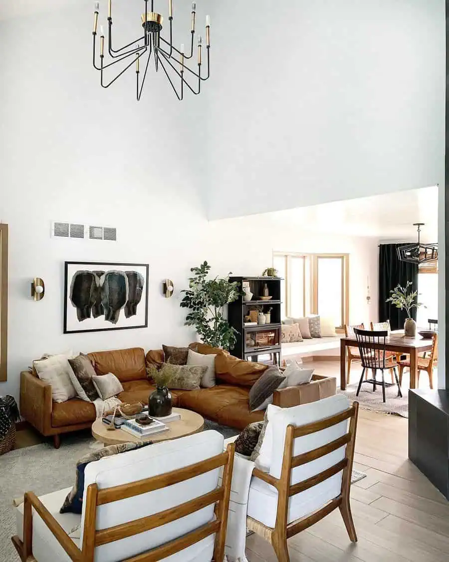 Mid-century modern living room with a leather sectional, wood accents, and minimalist decor.