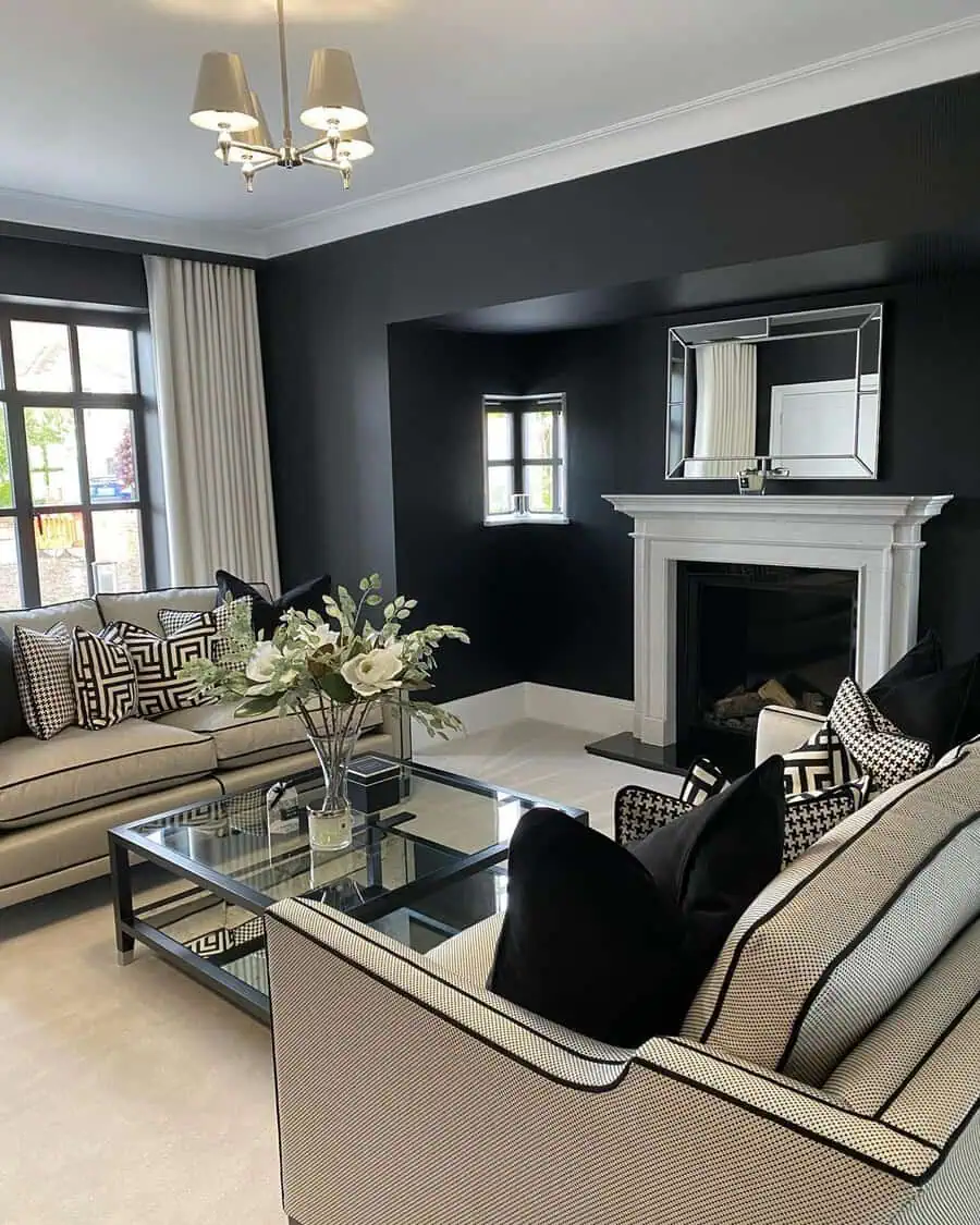 Chic minimalist fireplace design with a sleek mantel, elegant decor, and a striking black accent wall.