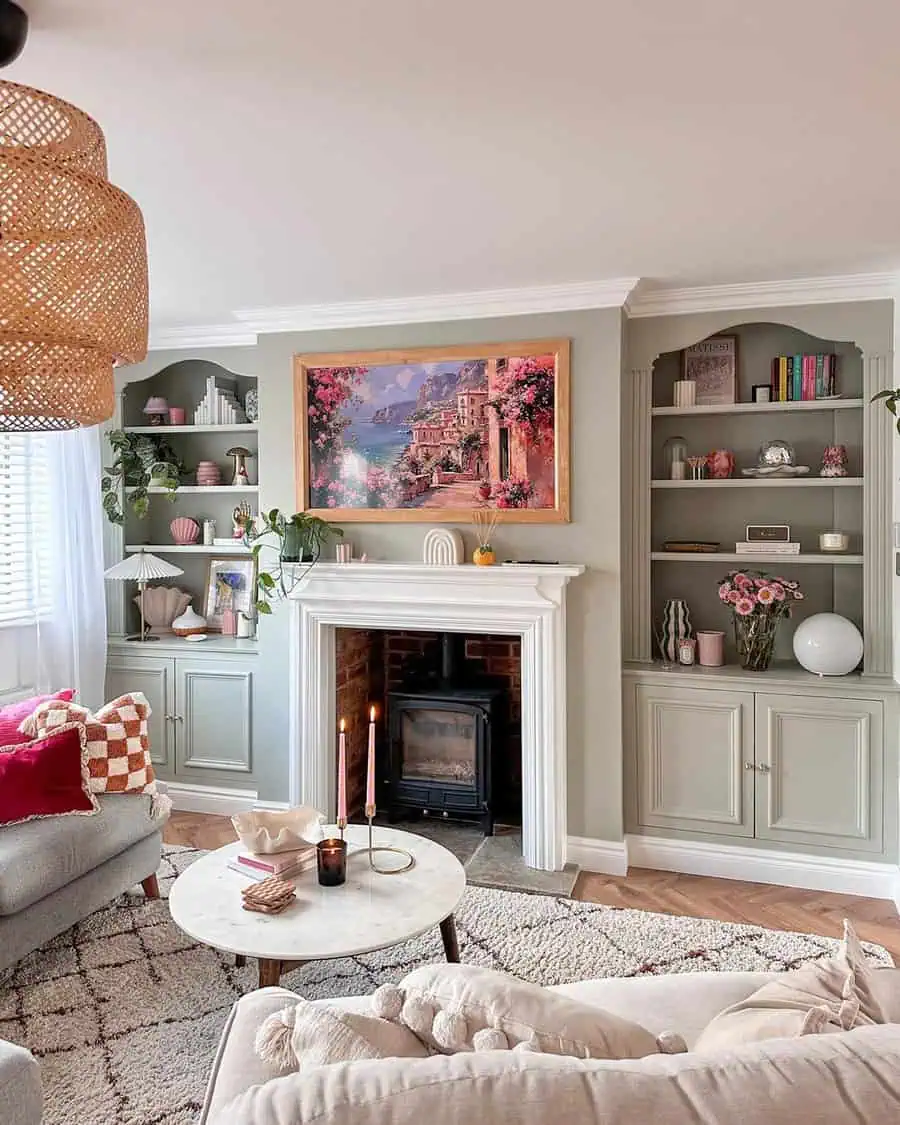 Cozy living room featuring a decorative fireplace, artwork above, and stylish shelving accents.