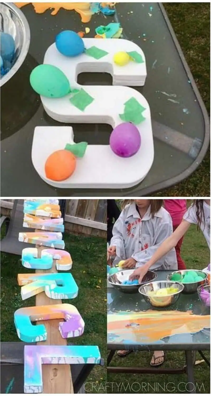 DIY craft activity with kids painting foam letters at a backyard birthday party.