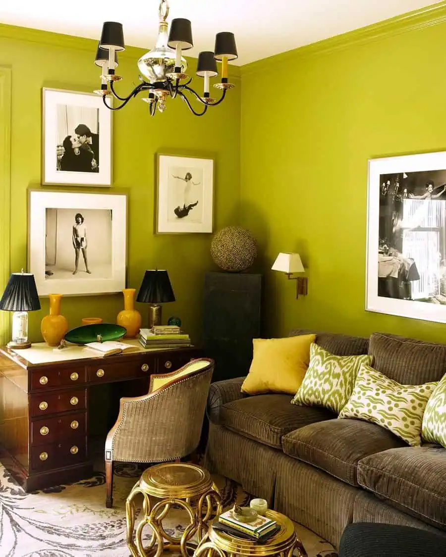 Vibrant den with lime green walls, cozy seating, antique desk, and eclectic decor accents.