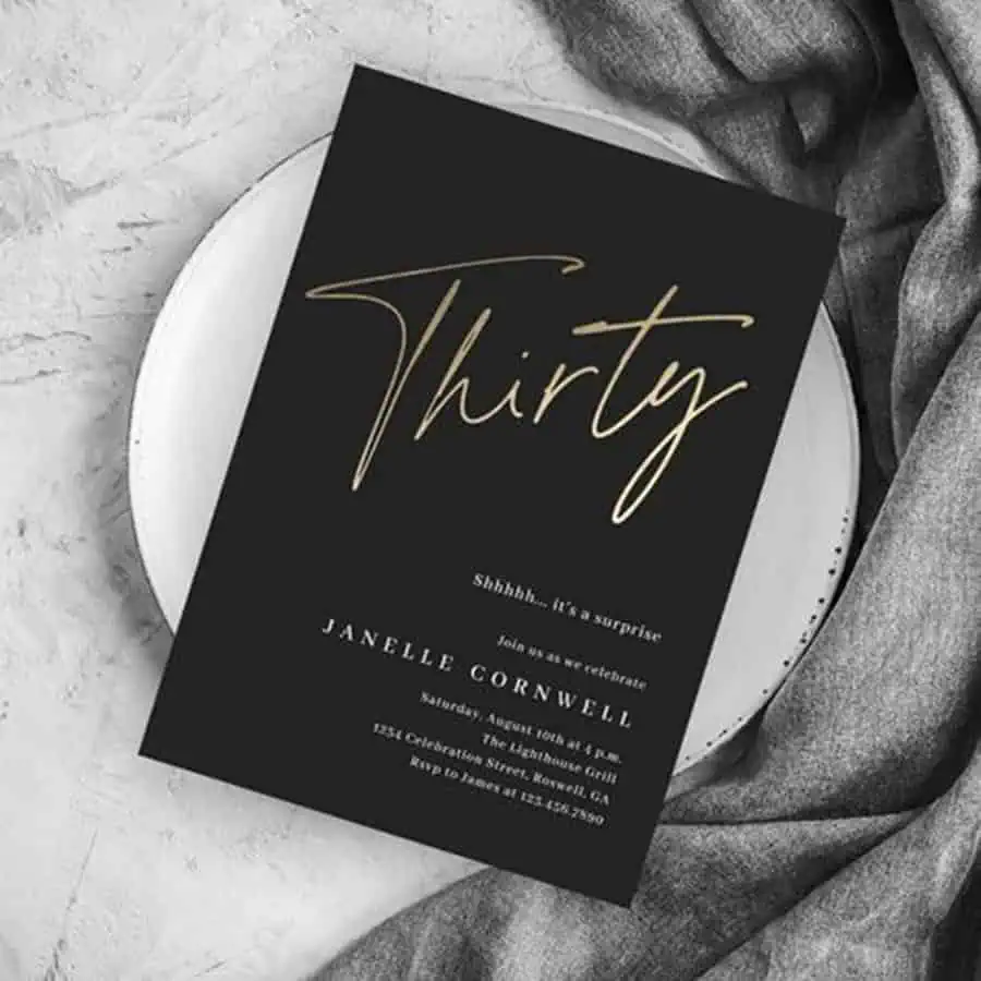 Elegant black and gold "Thirty" invitation card for a 30th birthday celebration.