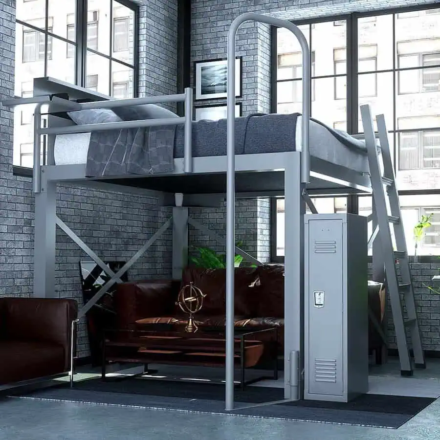 Industrial loft with a metal loft bed, brick walls, leather couch, and large factory windows.