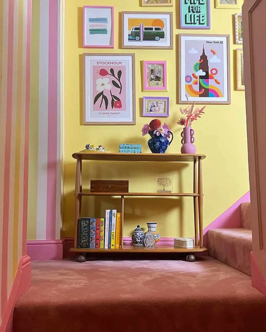 Colorful eclectic hallway with vibrant gallery wall, wooden console table, and decorative accents.