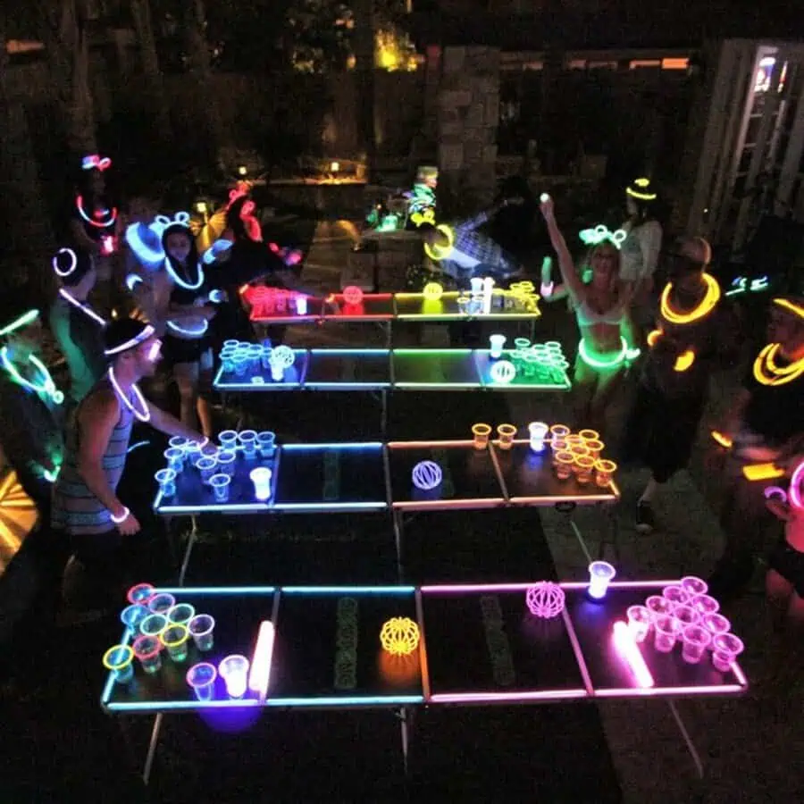 Glow-in-the-dark birthday party with neon-lit tables and vibrant party games.