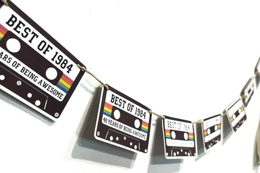 Retro-themed "Best of 1984" cassette tape banner celebrating 40 years of awesomeness.