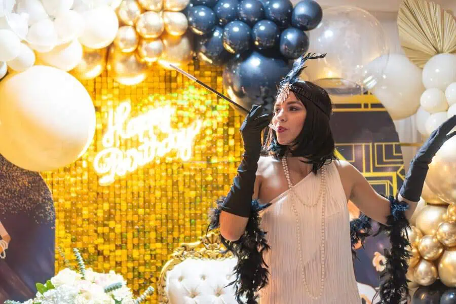 Glamorous Great Gatsby-themed 40th birthday celebration with gold and black decor.