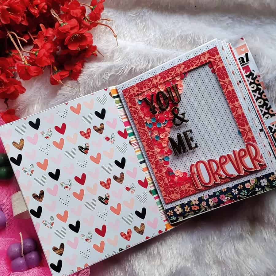 Anniversary scrapbook idea for couples with heart patterns and "You & Me Forever" text design.