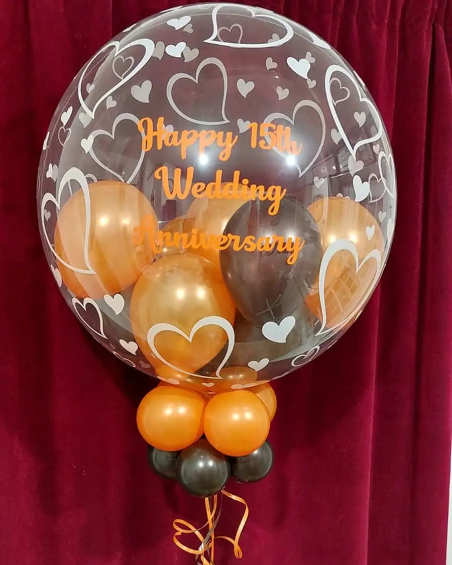 A personalized balloon arrangement to celebrate a 15th wedding anniversary with style and love.