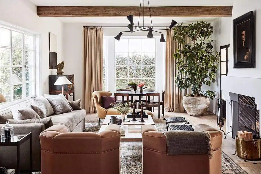 A cozy rustic modern Spanish-style living room with natural textures and earthy tones.