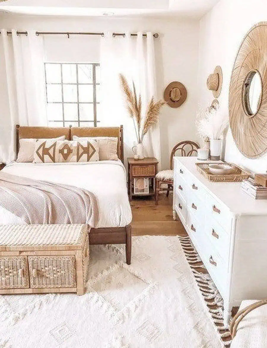 Boho Scandinavian bedroom with natural tones, wicker accents, and cozy textiles.