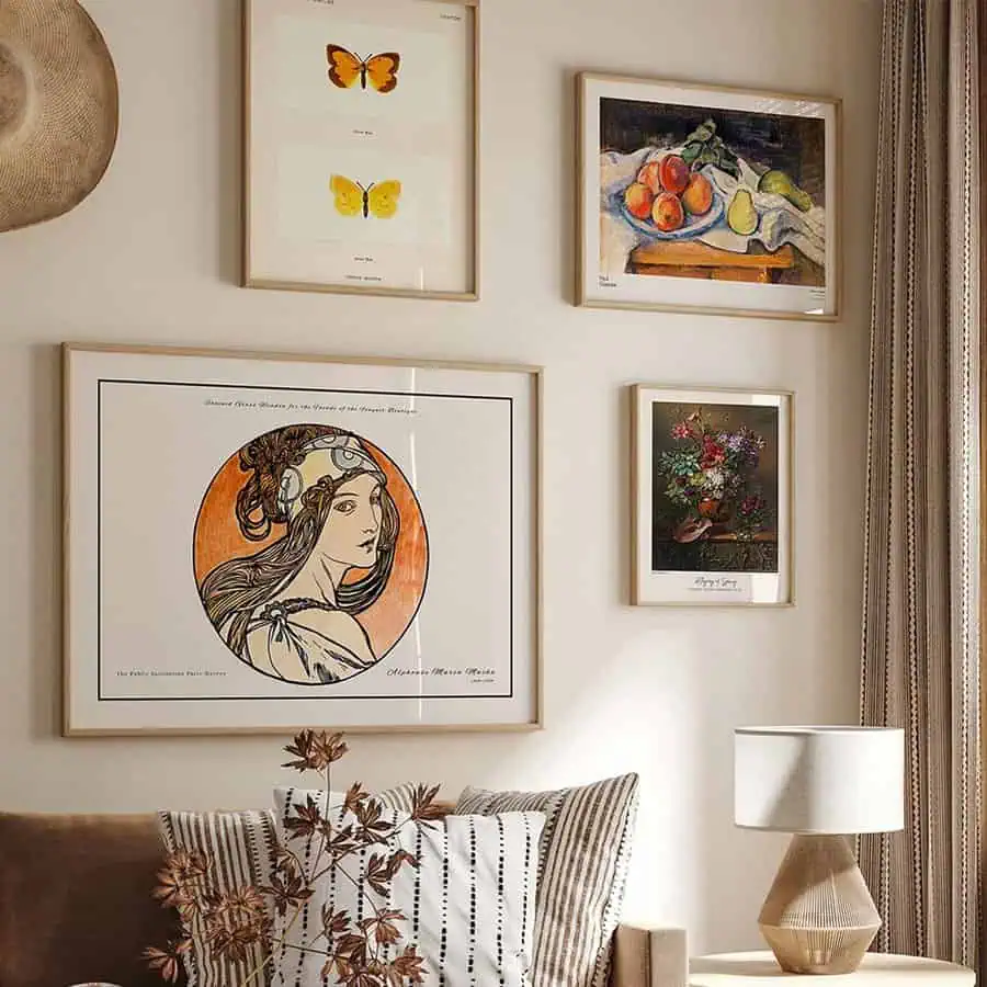 Scandinavian wall art gallery with framed prints and earthy-toned decor.