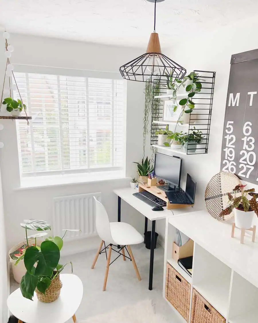 Bright Scandinavian workspace with natural light, greenery, and functional minimalist furniture.