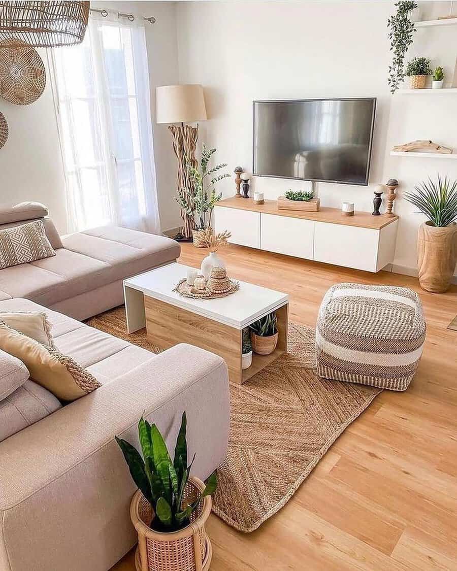 Scandinavian living room with neutral tones, natural textures, and indoor plants.