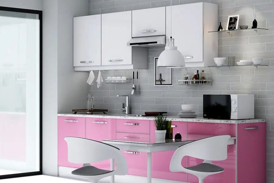 A modern kitchen with glossy white upper cabinets, vibrant pink lower cabinets, and a sleek gray backsplash.