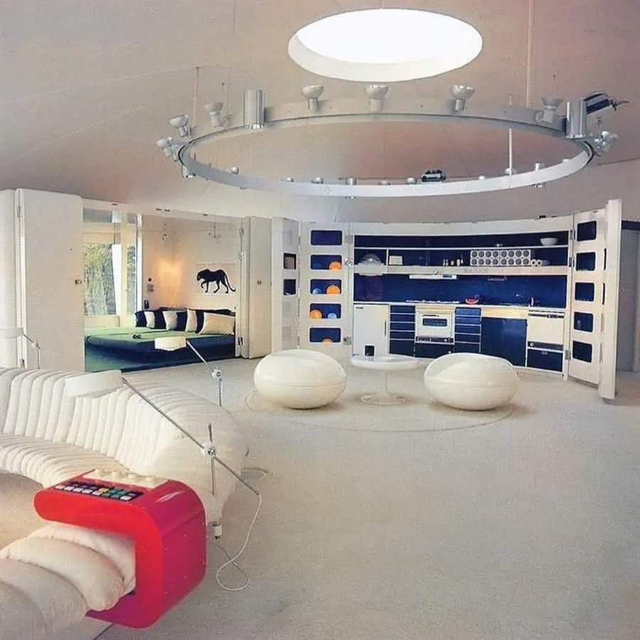 1960s space-age living room with futuristic furniture, sleek design, and a circular skylight.