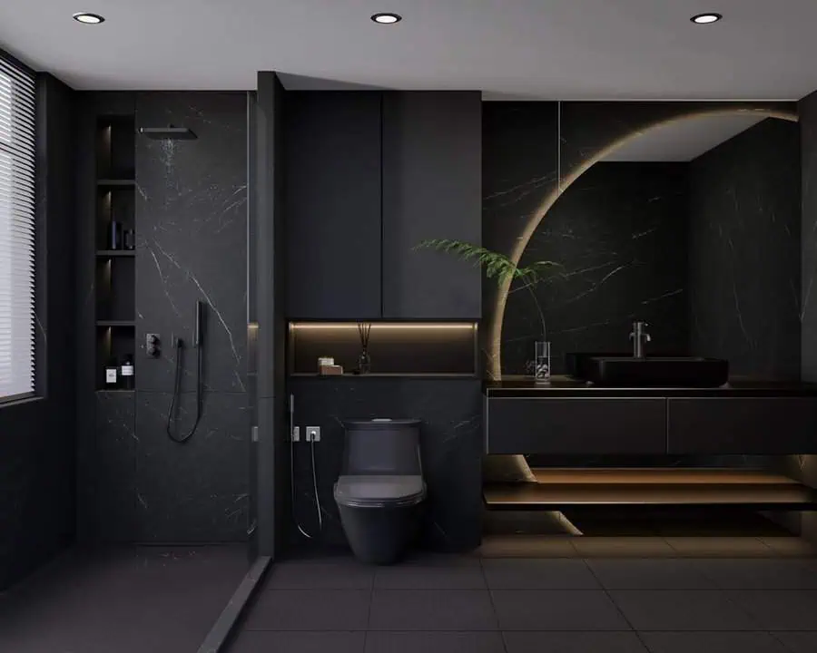 Modern black bathroom with marble walls, ambient lighting, and a sleek floating vanity.