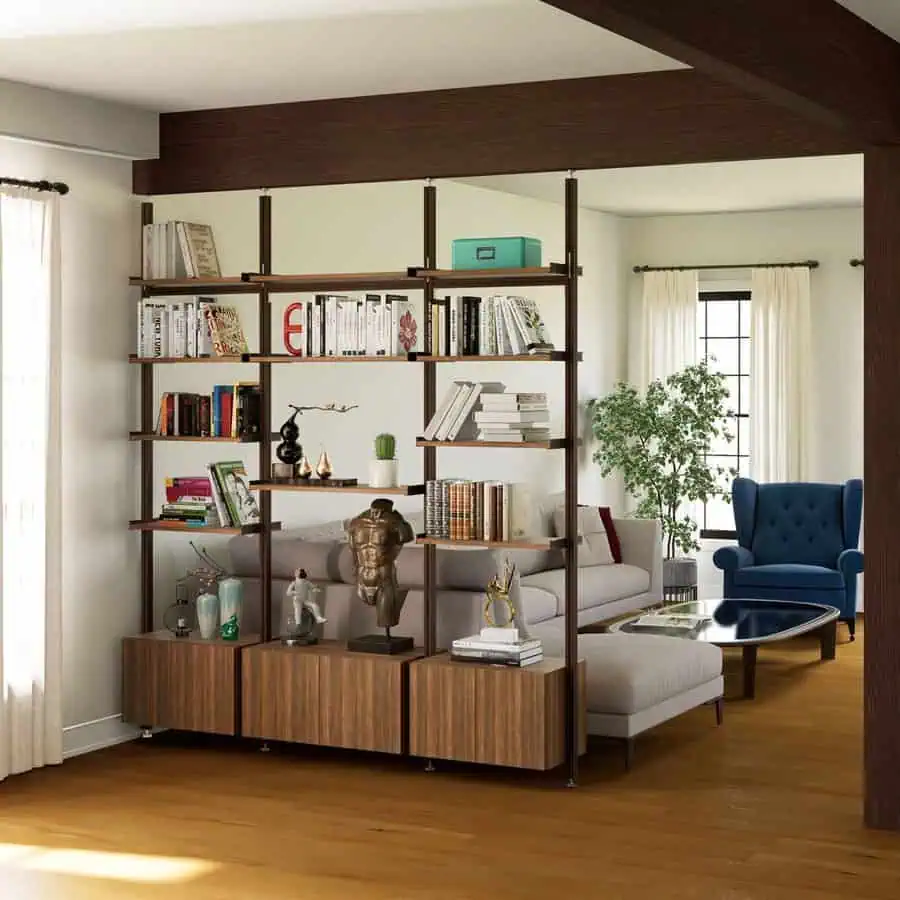 Modern bookshelf room divider with open shelving, books, and decorative accents in a cozy living room.