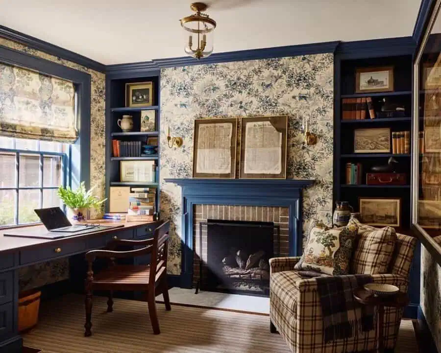 Fireplace home library with navy bookshelves, warm lighting, and a cozy vintage ambiance.