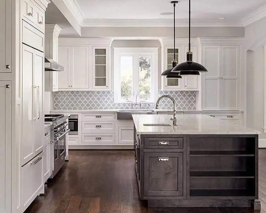 Gray patterned backsplash adding subtle contrast to white cabinets for a stylish, elegant look.