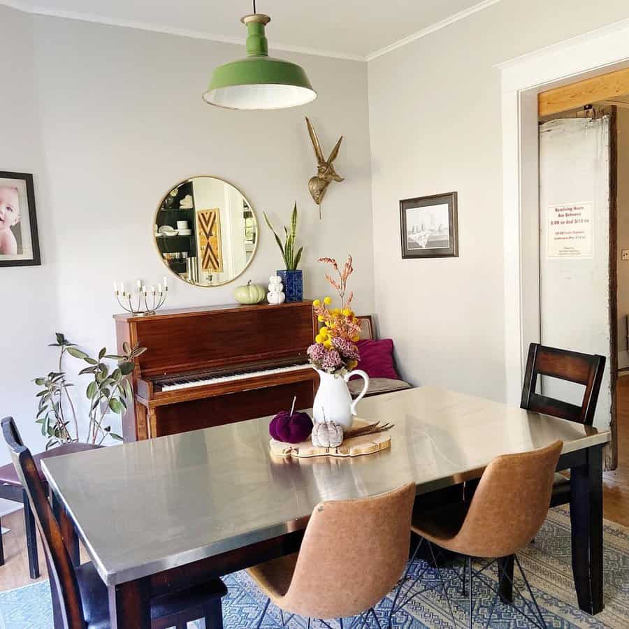 Historic Dutch Colonial home interior with modern elements, featuring neutral tones, vintage decor, and contemporary furnishings.