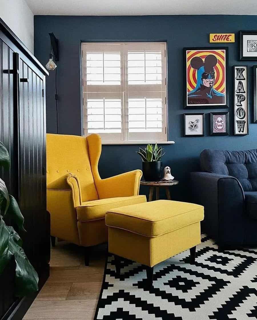 Navy blue living room with a bold yellow armchair, graphic wall art, and a black-and-white rug.