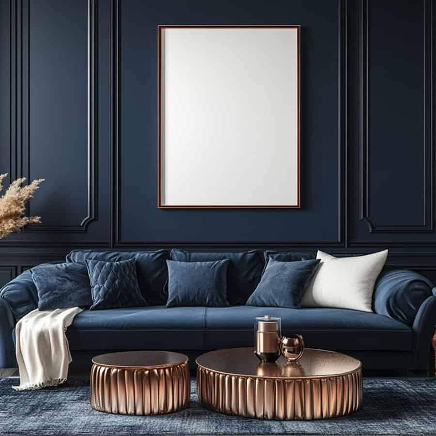 Navy blue living room with a velvet sofa, copper coffee tables, and elegant wall paneling.