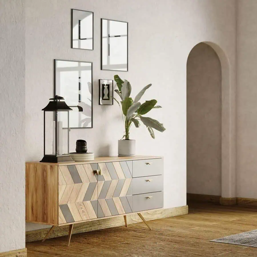 Rustic charm meets modern design with mixed wood tones, a geometric sideboard, and minimalist decor.