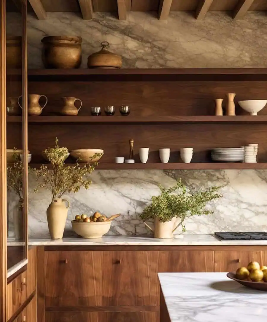 Simple kitchen design with rich wood cabinetry, open shelving, and marble backsplash for a warm look.