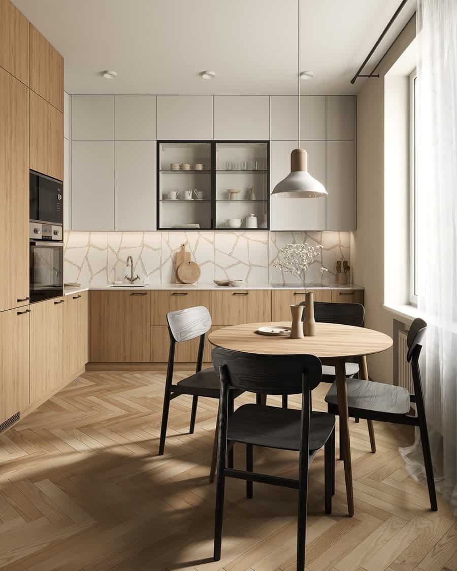 Simple kitchen design with wood cabinets, round table, and black chairs for a warm look.