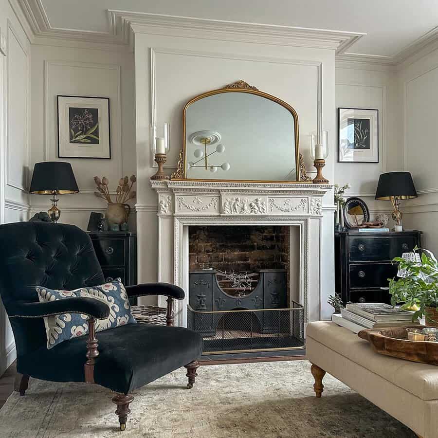 Luxurious Georgian-inspired living room featuring a carved white mantel, velvet armchair, and refined black-and-gold decor.