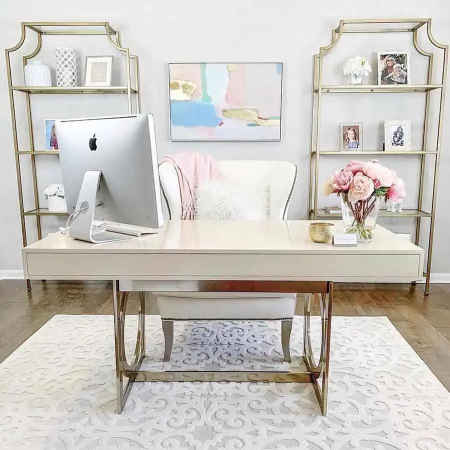 Elegant home office with modern design, personal touches, and a balanced mix of soft neutrals and gold for a unique, inviting space.