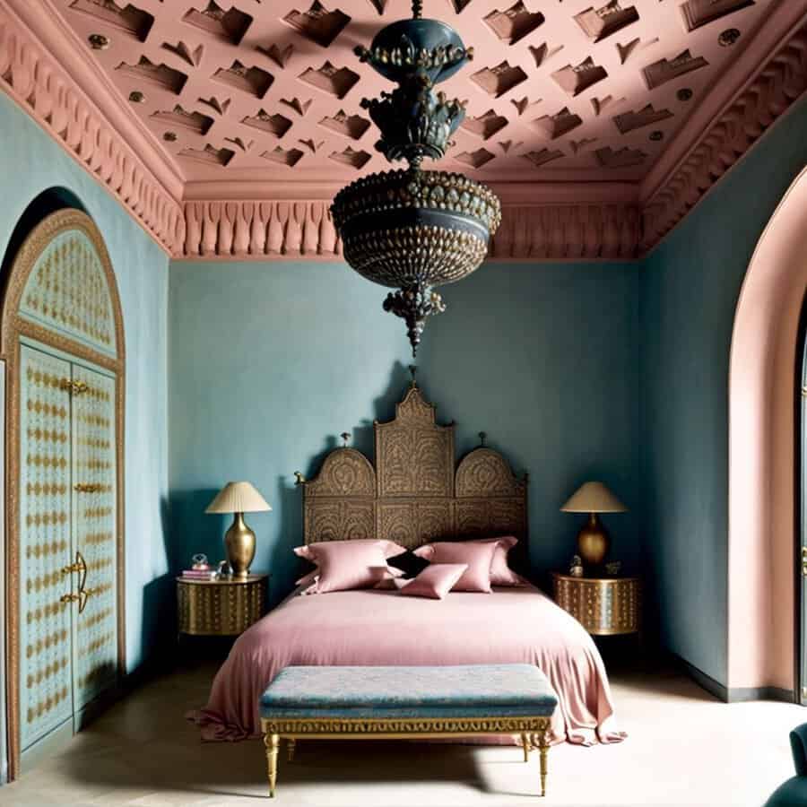 Luxury bedroom with a Moorish-inspired sitting area, arched alcoves, carved details, plush seating, and statement chandeliers.